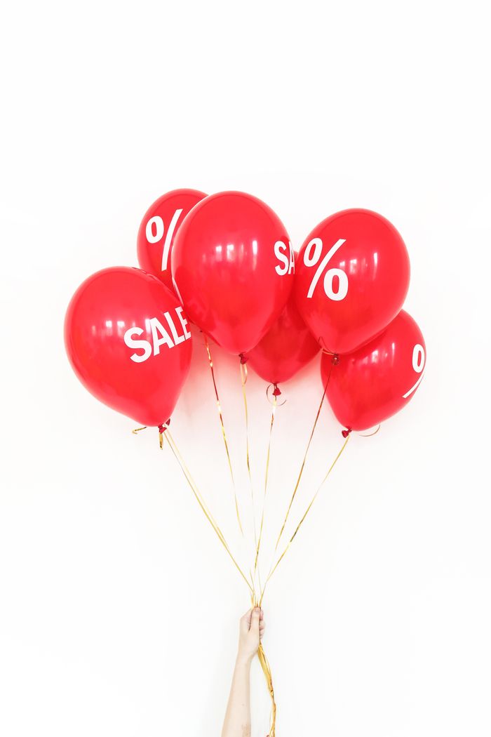 Crafting Captivating Headlines: Your awesome post title goes here Red balloons with white SALE signs perfect for promotional marketing materials.